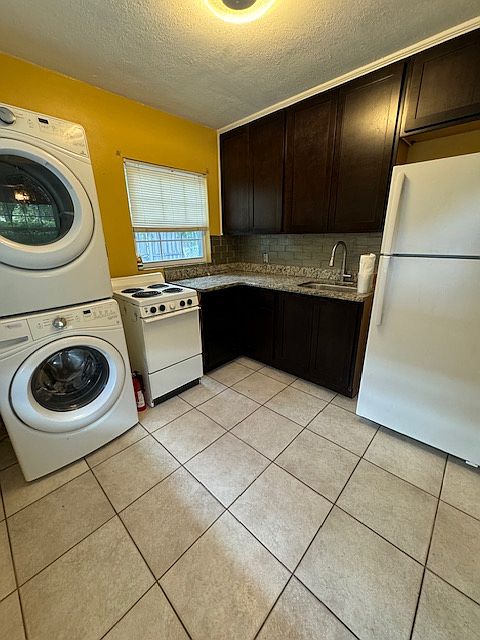 kitchen. there is a hook up for a washer and dryer. Landlord does not provide washer and dryer