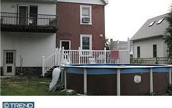large back yard, two decks