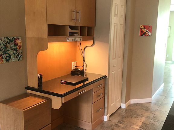 Work Desk consisting of custom made Designer Brookhaven Maple Desk with uppers and lowers.