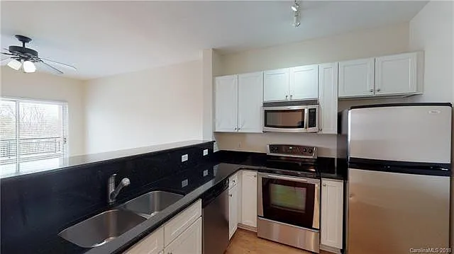 Located in the heart of Dilworth in the amazing 1315 East building, this stunning condo is clean ... — Photo 2