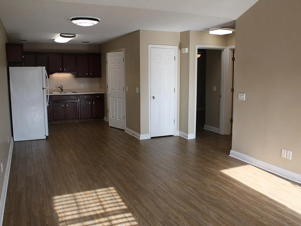 Living room looking into dining/kitchen area/spacious open floor plan