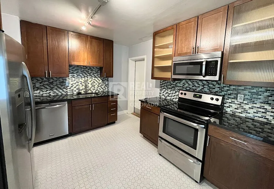 Charming 3-Bedroom Denver Home with Sunroom & Attached Garage — Photo 2