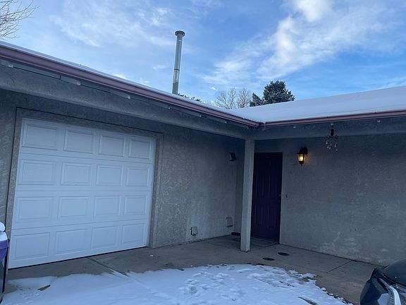 The front door with keyless entry and a spacious one car garage. There is an extra storage closet inside the garage for your storage needs.