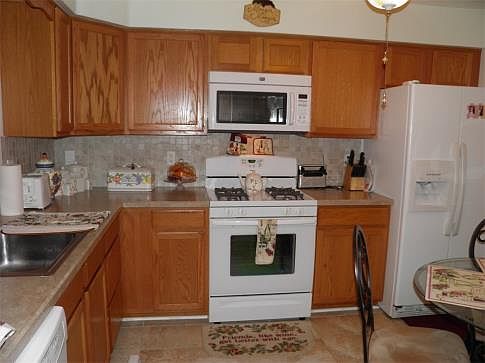 New Kitchen Tile Floors, Backsplash, Counters