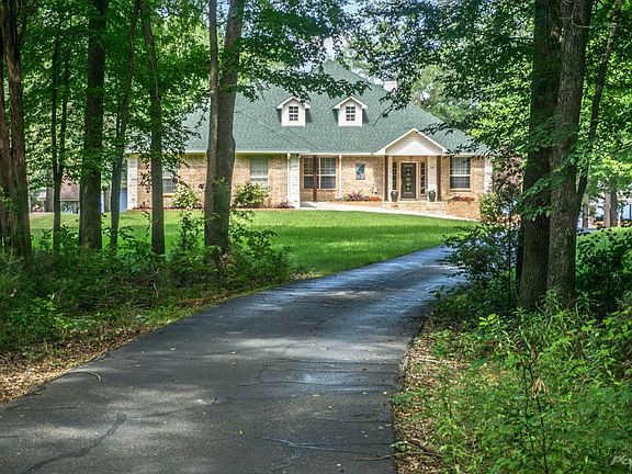 Gorgeous home at end of tree lined drive