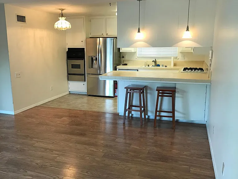 Kitchen, Bar, Dining area, & Family Room