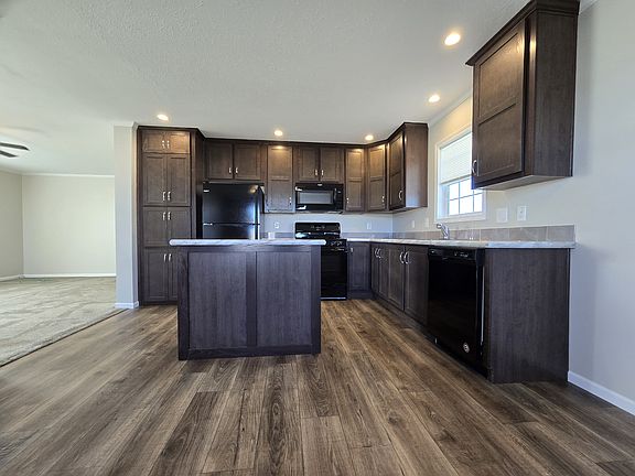 3rd image of 7204 E Grand River Ave Lot 312