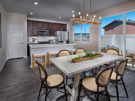 Residence 3 dining room modeled at a nearby Meritage community.