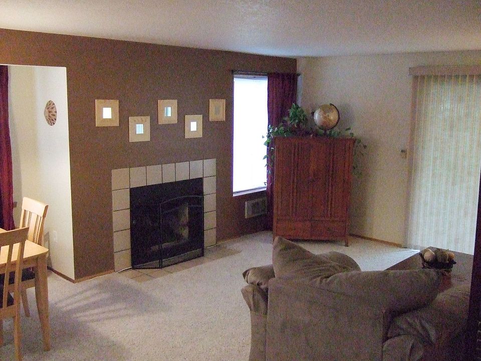 Family room with wood burning fireplace