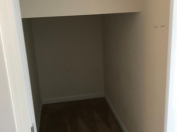 Storage underneath stairs.