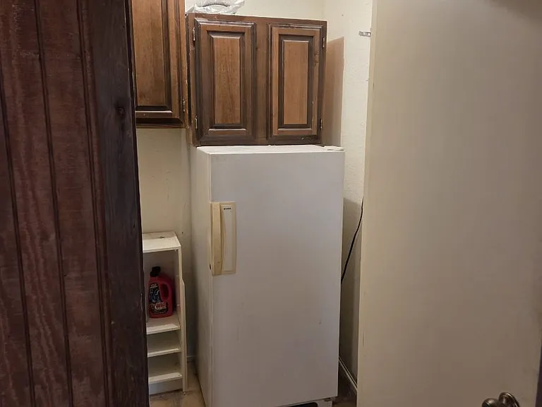 Storage with upright freezer