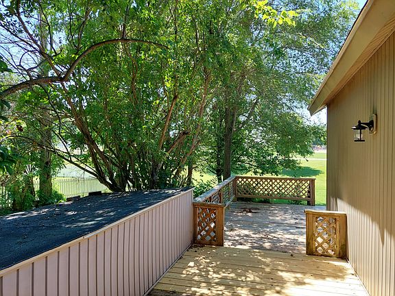 Deck on left side of house