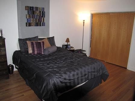 Queen sized bed fits easily in the bedroom