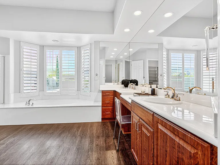 PRIMARY BEDROOM SUITE HAS DUAL SINKS