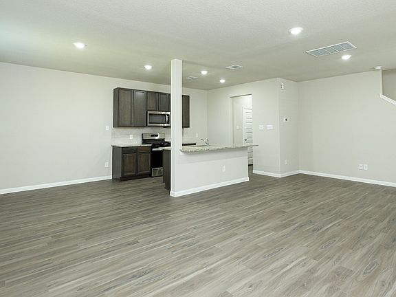 Family Room to Kitchen and Dining Area