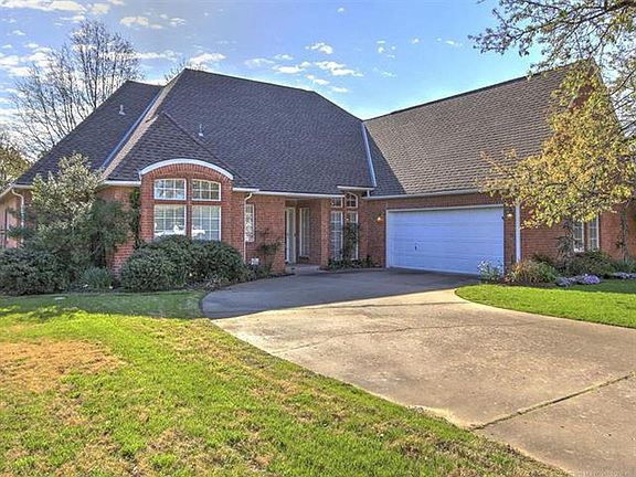 Exterior Front - Garage side entry with plenty of space for guest parking