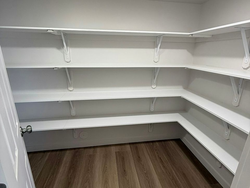 Large Pantry with LVP flooring , Recess Lighting