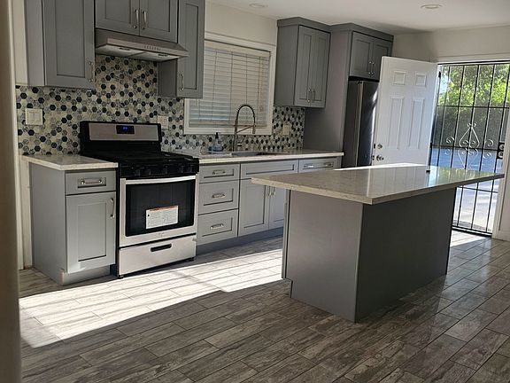 Open Kitchen & Living Area - Two Exits