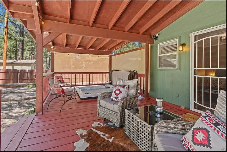 Unwind on the private back deck with lots of seating for gathering to relax.