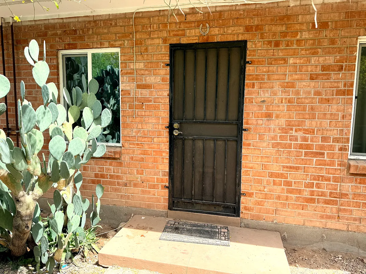 Kitchen side entrance to unit. - 1822 E 8th St #1822