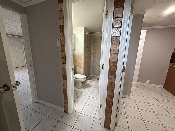 Sitting room on the left, bathroom (middle) and pantry (right)