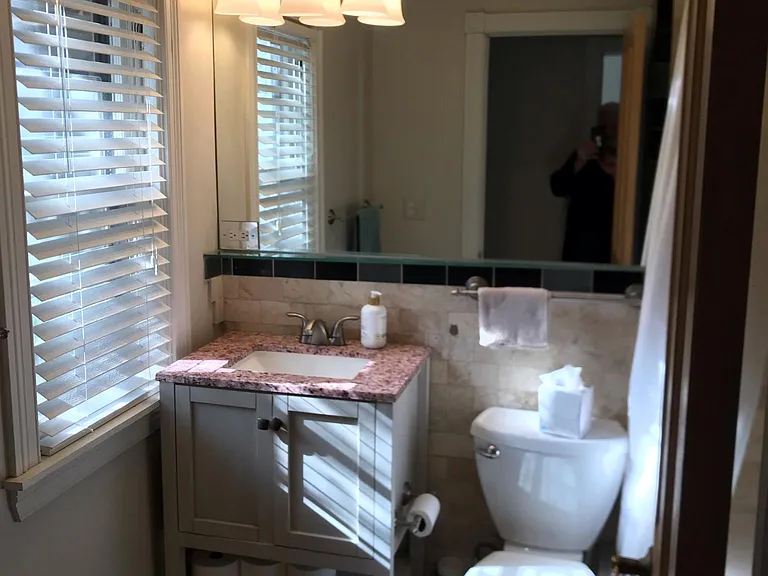 En suite full bath with jacuzzi tub and shower.