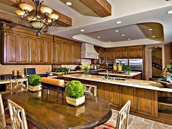 This gourmet kitchen is truly a chef's delight w/ top-of-the-line appliances