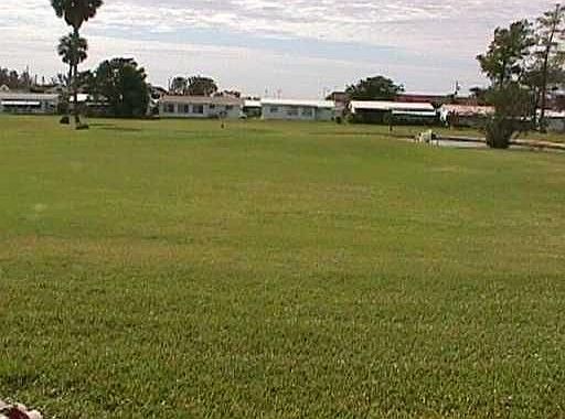 BACKYARD VIEW OF PRIVATE GOLF COURSE