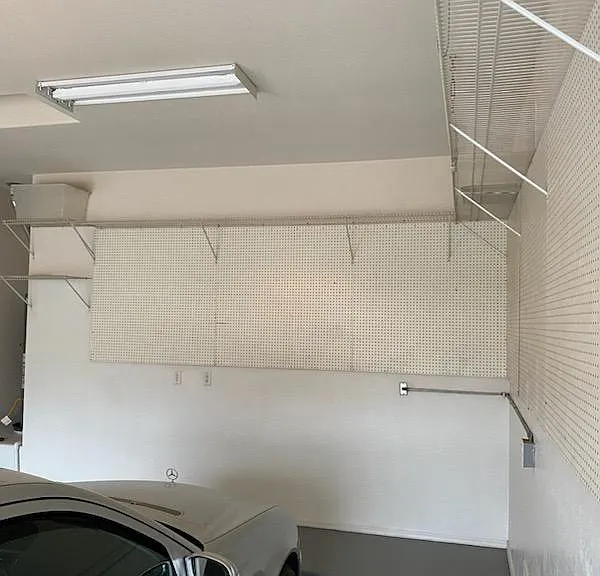 Spacious 2 car garage with lots of overhead storage space. Picture taken November 16, 2023 afternoon.