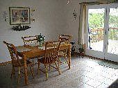 Dining Room w/ french door to deck