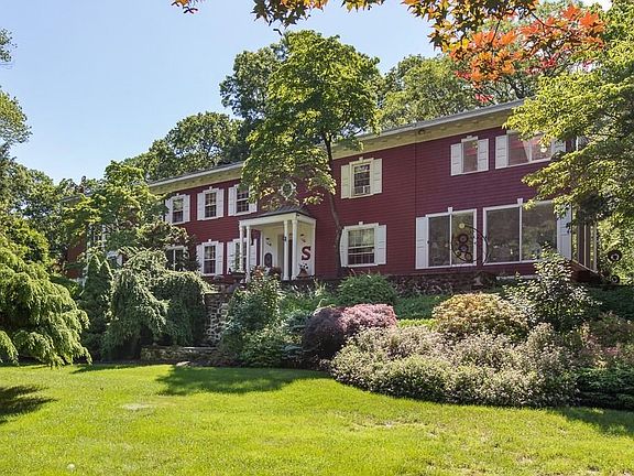 Set on park like 7+ acres, this 4900 sq ft home features 5 bedrooms and 3.5 baths with gracious formal and more casual living areas.