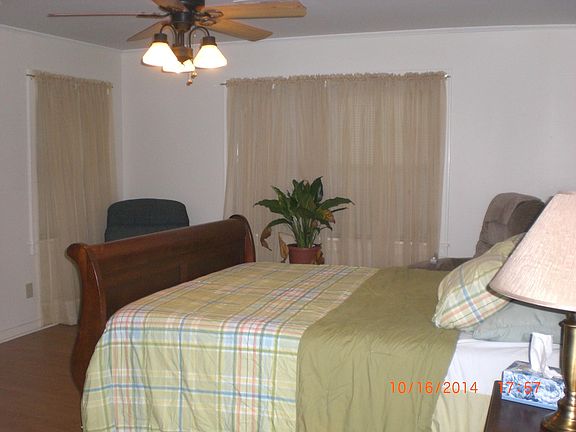 Queen size bed with memory foam mattress.