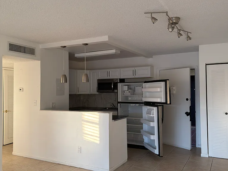 9108 SW 137th Ter #H — Photo 10