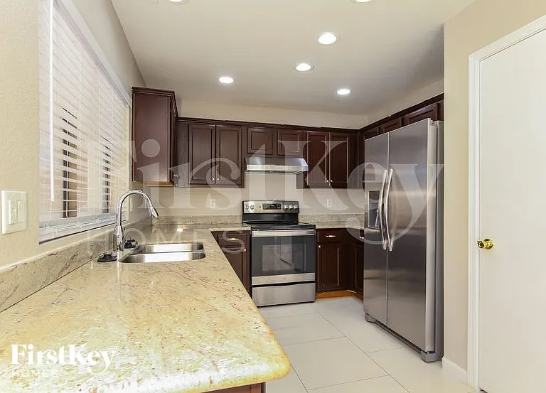7159 W Stella Ave — Photo 8