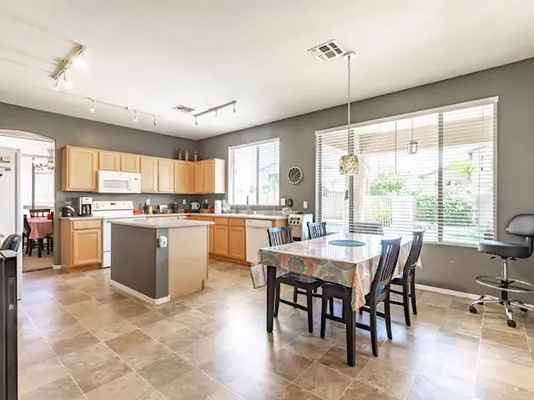 Large, spacious, open kitchen with plenty of room for cooking and gathering! Table seats 6.