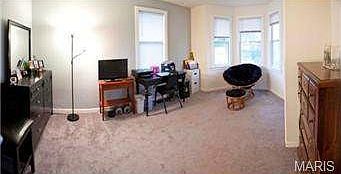 Rear bedroom: 15'x 12'. Has bay window and double closet.