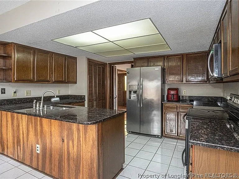 6821 Thames Dr — Photo 17