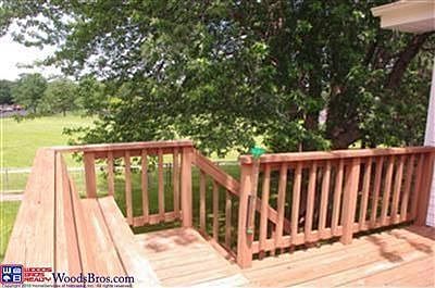 Deck with built-in bench looking onto common area