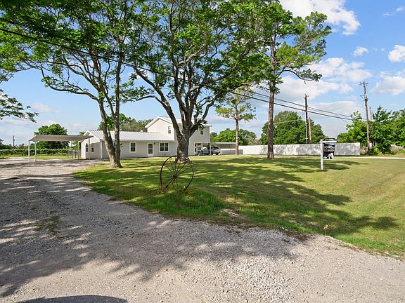 Setback off the main road with plenty of yard space!