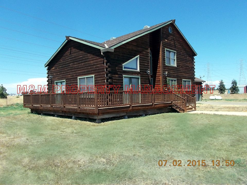 11889 Hobday Rd Log Home in Wilton