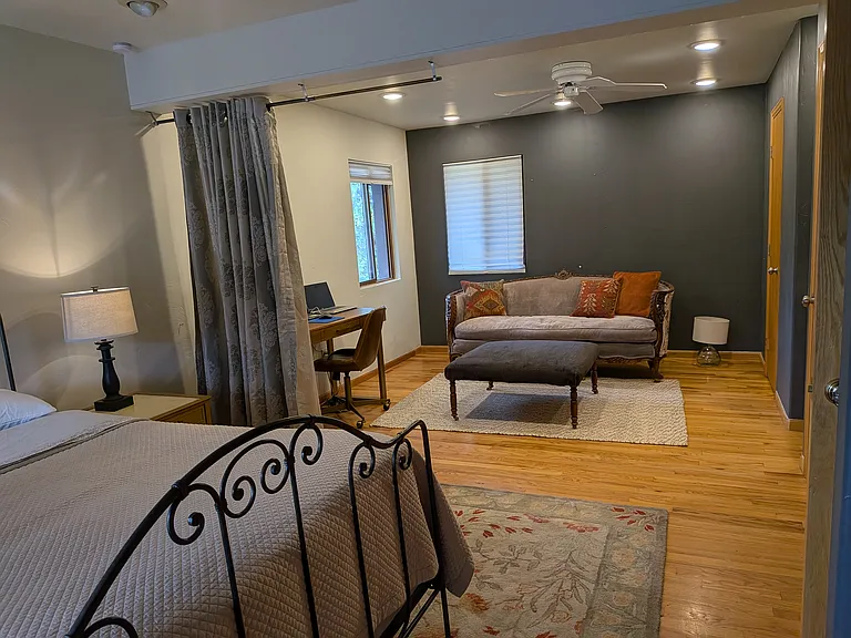 Large Master Bedroom (with heat rated gas fireplace, walk in closet, sink and sitting area)
