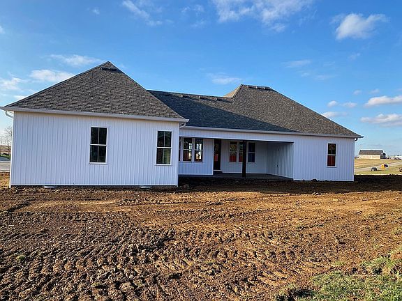 Covered porch; back of house