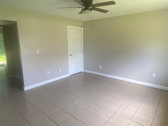 Front Room with ceiling fan