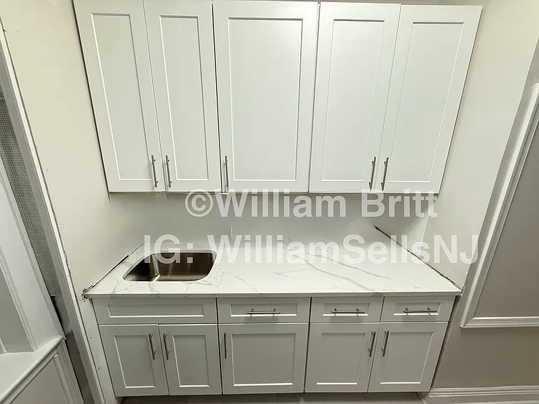 125-127 Corbin Ave #402 — Photo 2