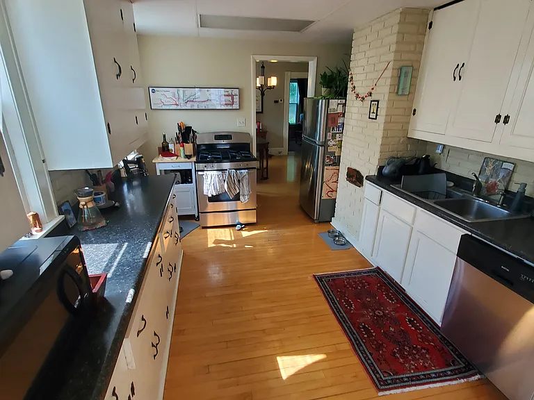 Lots of kitchen storage with stainless steel appliances and great light!