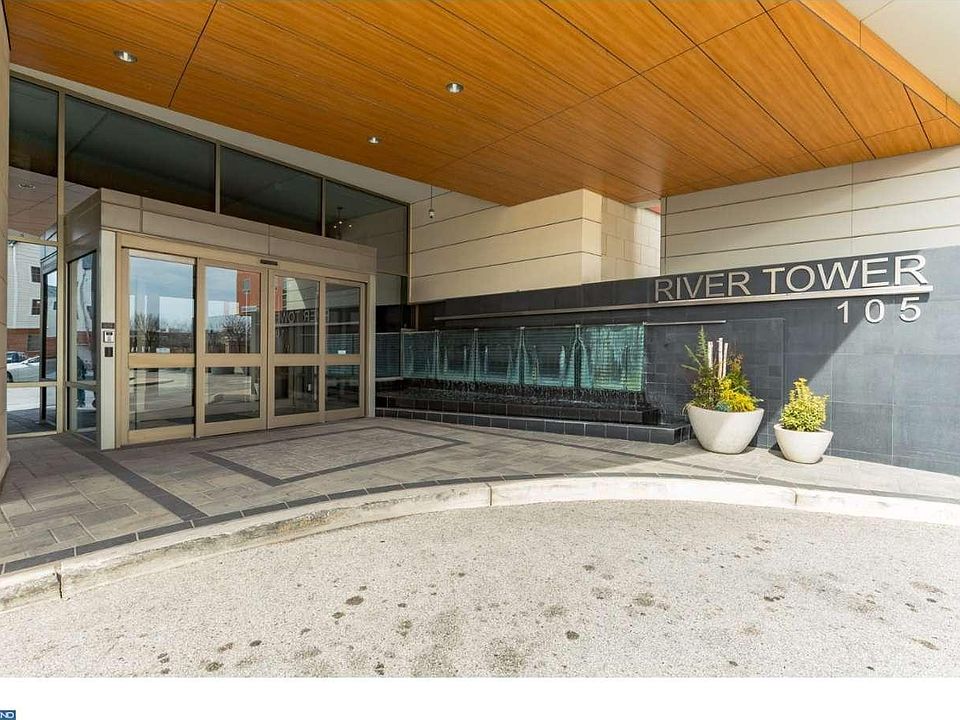 Main entrance of the River Tower welcomes you with cascading sound of the water fountain