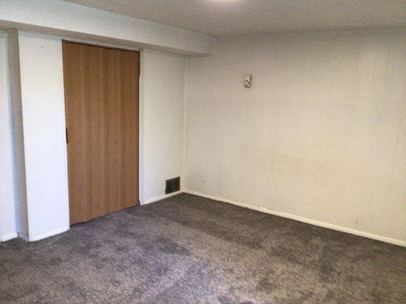 bedroom with 2 closets