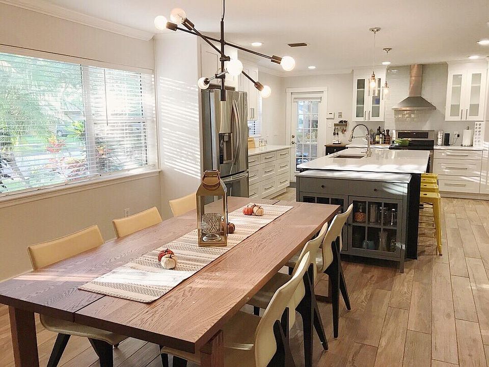Over-sized dining room open to the kitchen & living room. Wo