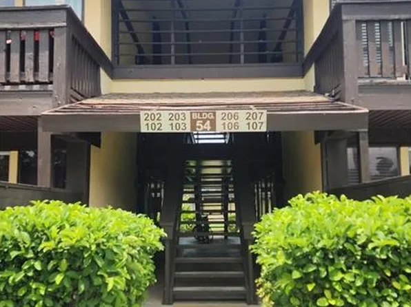 54 CLUB HOUSE DRIVE #103, PALM COAST, FL 32137