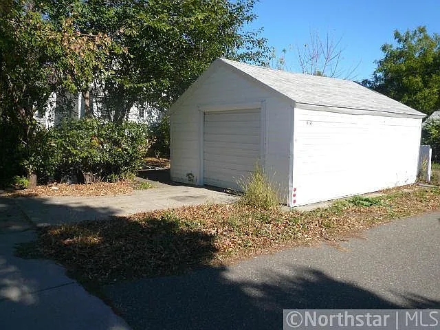 1 1/2 car garage with remote opener
complete wooded corner lot